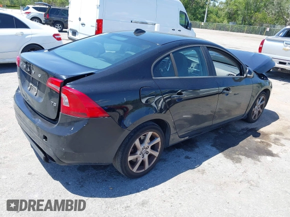 2014 Volvo S60 T5 with VIN YV1612FS1E2294154, listed as a IAAI auction lot 42046636 with 165,257 mi miles. Bid and sale history available at carsss.com. Image 4.