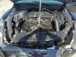 2016 Nissan GT-R Premium z VIN JN1AR5EF8GM290918, wystawiony jako Copart lot #58314455 z przebiegiem 23 667 mil mil oraz Szkody całkowita. Historia ofert i sprzedaży dostępna na DreamBid. Obrazek 11.