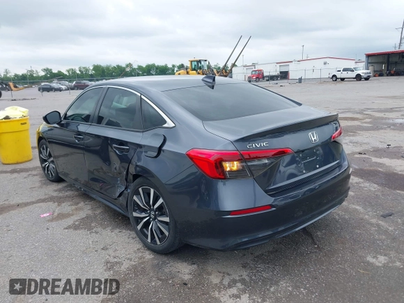 2023 Honda Civic EX with VIN 2HGFE1F73PH312228, listed as a IAAI auction lot 42185408 with 19,339 mi miles and . Bid and sale history available at DreamBid. Image 3.