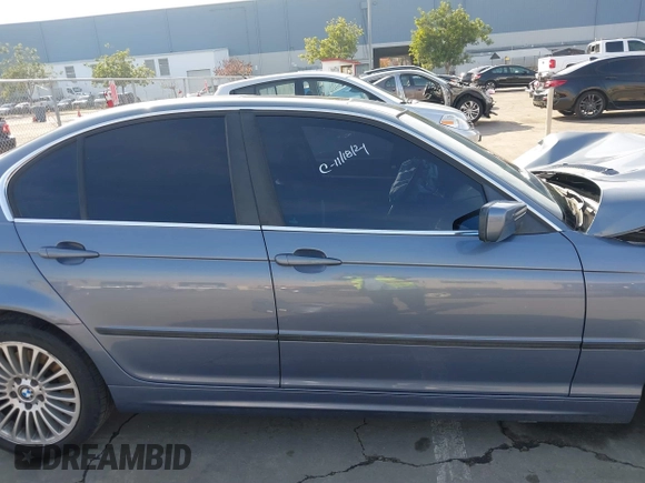 2003 BMW 3 Series 330i with VIN WBAEV53453KM03321, listed as a IAAI auction lot 41134433 with 186,586 mi miles. Bid and sale history available at carsss.com. Image 14.
