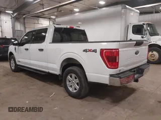 2023 Ford F-150 XL with VIN 1FTFW1ED6PFC14587, listed as a IAAI auction lot 41827273 with 87,267 mi miles. Bid and sale history available at carsss.com. Image 3.