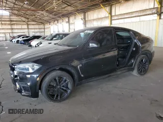 2016 BMW X6 M with VIN 5YMKW8C57G0R43033, listed as a Copart auction lot 54431094 with 65,370 mi miles. Bid and sale history available at carsss.com. Image 1.