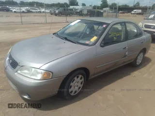 2001 Nissan Sentra GXE z VIN 3N1CB51D61L500385, wystawiony jako IAAI lot #28091277 z przebiegiem 172 807 mil mil oraz . Historia ofert i sprzedaży dostępna na DreamBid. Obrazek 2.