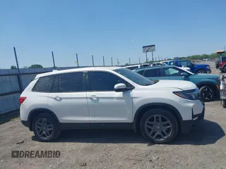 2023 Honda Passport EX-L z VIN 5FNYF8H57PB006499, wystawiony jako IAAI lot #42036371 z przebiegiem 51 404 mil mil oraz . Historia ofert i sprzedaży dostępna na DreamBid. Obrazek 14.