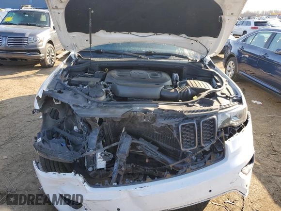 2021 Jeep Grand Cherokee 80th Anniversary with VIN 1C4RJFBG6MC674921, listed as a Copart auction lot 49873555 with 52,668 mi miles and Salvage Title. Bid and sale history available at DreamBid. Image 13.