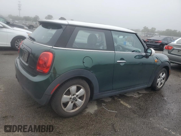 2017 MINI Hardtop Cooper with VIN WMWXP5C55H2D16587, listed as a Copart auction lot 60855195 with 77,769 mi miles and Salvage title. Bid and sale history available at DreamBid. Image 3.