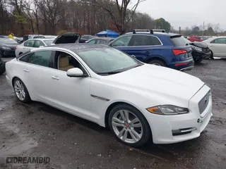 2017 Jaguar XJ with VIN SAJWA2G73H8W04310, listed as a IAAI auction lot 40914491 with 62,102 mi miles. Bid and sale history available at carsss.com. Image 13.