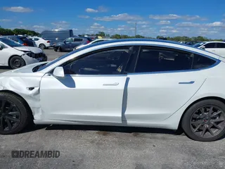 2020 Tesla Model 3 Standard Range Plus with VIN 5YJ3E1EA8LF783631, listed as a IAAI auction lot 40696383 with 78,889 mi miles. Bid and sale history available at carsss.com. Image 13.