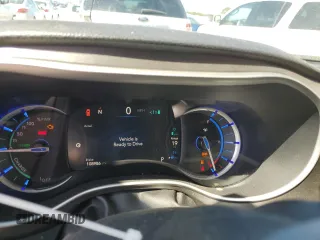 2021 Chrysler Pacifica Hybrid Touring L with VIN 2C4RC1L72MR599413, listed as a Copart auction lot 56419875 with 108,986 mi miles and Salvage title. Bid and sale history available at DreamBid. Image 9.