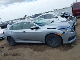 2018 Honda Civic LX with VIN 2HGFC2F50JH500559, listed as a IAAI auction lot 42040271 with 82,026 mi miles and . Bid and sale history available at DreamBid. Image 13.