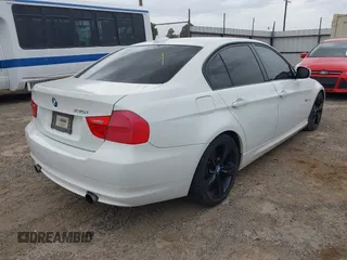 2011 BMW 3 Series 335i with VIN WBAPM5C54BE435453, listed as a IAAI auction lot 42048082 with 156,706 mi miles. Bid and sale history available at carsss.com. Image 4.