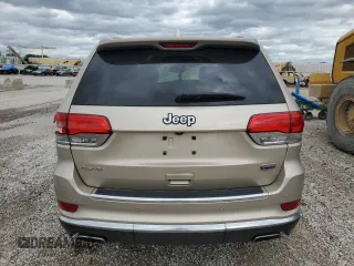 2014 Jeep Grand Cherokee Summit с VIN 1C4RJFJG8EC219264, выставлен на аукционе Copart как лот 57696025 с пробегом Не указан миль и Списание • Salvage title. История ставок и продаж доступна на DreamBid. Изображение 6.