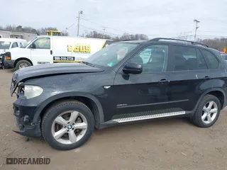 2009 BMW X5 30i with VIN 5UXFE43579L037535, listed as a IAAI auction lot 41715317 with 210,697 mi miles. Bid and sale history available at carsss.com. Image 19.