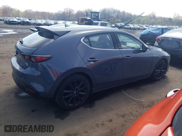 2021 Mazda 3 Premium Plus z VIN JM1BPBNY7M1311309, wystawiony jako Copart lot #54044315 z przebiegiem 59 642 mil mil oraz Szkoda całkowita • Salvage title. Historia ofert i sprzedaży dostępna na DreamBid. Obrazek 3.