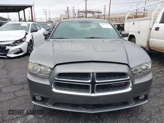 2012 Dodge Charger SXT with VIN 2C3CDXHG1CH278891, listed as a IAAI auction lot 38667338 with 114,099 mi miles. Bid and sale history available at carsss.com. Image 6.