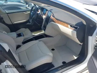 2017 Tesla Model S 100D with VIN 5YJSA1E20HF232570, listed as a IAAI auction lot 42037409 with 68,957 mi miles and . Bid and sale history available at DreamBid. Image 5.