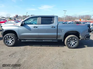 2019 Chevrolet Silverado 1500 Custom Trail Boss with VIN 3GCPYCEF5KG148682, listed as a IAAI auction lot 41826656 with 54,682 mi miles. Bid and sale history available at carsss.com. Image 14.