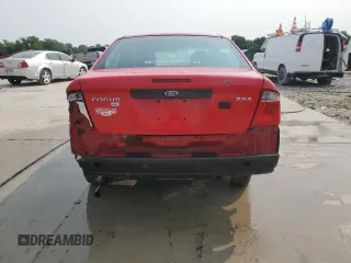 2006 Ford Focus S z VIN 1FAFP34NX6W195677, wystawiony jako Copart lot #59049645 z przebiegiem 177 621 mil mil oraz Szkoda całkowita • Salvage title. Historia ofert i sprzedaży dostępna na DreamBid. Obrazek 6.