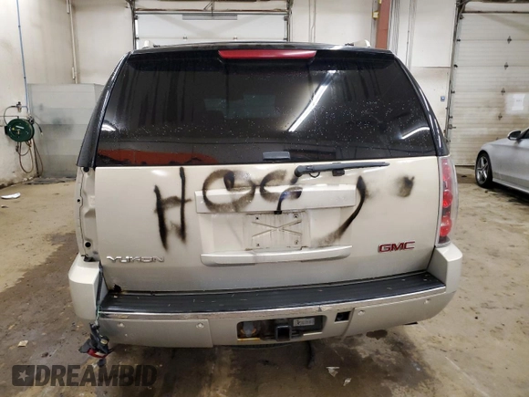 2007 GMC Yukon Denali z VIN 1GKFK638X7J301747, wystawiony jako Copart lot #57597345 z przebiegiem 186 365 mil mil oraz Szkoda całkowita • Salvage title. Historia ofert i sprzedaży dostępna na DreamBid. Obrazek 6.