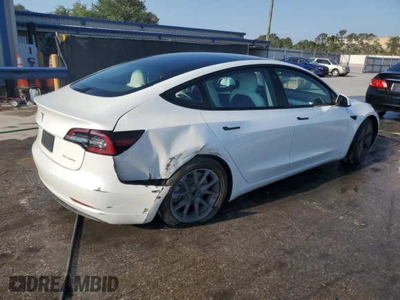 2022 Tesla Model 3 Long Range with VIN 5YJ3E1EB2NF199141, listed as a Copart auction lot 53069145 with 67,140 mi miles and Non Repairable. Bid and sale history available at DreamBid. Image 3.