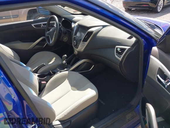 2012 Hyundai Veloster w/Gray Int z VIN KMHTC6AD3CU074501, wystawiony jako IAAI lot #42289456 z przebiegiem 94 303 mil mil oraz . Historia ofert i sprzedaży dostępna na DreamBid. Obrazek 5.