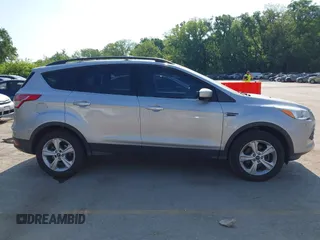 2013 Ford Escape SE z VIN 1FMCU0GX3DUC23910, wystawiony jako IAAI lot #42245926 z przebiegiem 159 076 mil mil oraz . Historia ofert i sprzedaży dostępna na DreamBid. Obrazek 14.