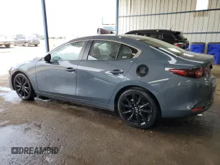 2024 Mazda 3 S Carbon Edition with VIN 3MZBPBCM3RM410653, listed as a Copart auction lot 55505645 with 26,729 mi miles and Salvage Title. Bid and sale history available at DreamBid. Image 2.