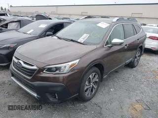 2021 Subaru Outback Touring XT with VIN 4S4BTGPD3M3102670, listed as a IAAI auction lot 42517137 with 25,853 mi miles and . Bid and sale history available at DreamBid. Image 2.