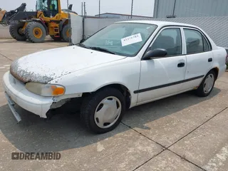 2001 Chevrolet Prizm z VIN 1Y1SK52881Z428636, wystawiony jako IAAI lot #42372783 z przebiegiem 169 729 mil mil oraz . Historia ofert i sprzedaży dostępna na DreamBid. Obrazek 2.