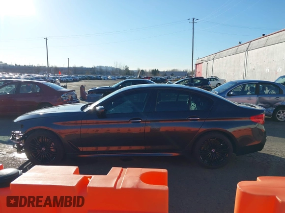 2018 BMW 5 Series 540i with VIN WBAJE5C58JG918692, listed as a IAAI auction lot 41665415 with 61,261 mi miles and . Bid and sale history available at carsss.com. Image 15.
