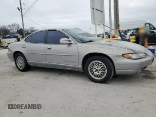 2000 Pontiac Grand Prix SE with VIN 1G2WJ52K5YF285584, listed as a Copart auction lot 84926094 with 123,146 mi miles and Salvage Title. Bid and sale history available at carsss.com. Image 4.