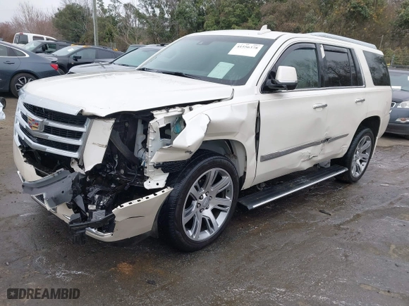 2015 Cadillac Escalade Premium with VIN 1GYS4NKJ9FR547587, listed as a IAAI auction lot 41556378 with 155,038 mi miles. Bid and sale history available at carsss.com. Image 2.