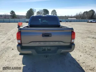 2021 Toyota Tacoma 4WD SR with VIN 5TFCZ5AN6MX252195, listed as a Copart auction lot 48234085 with 56,983 mi miles and Salvage Title. Bid and sale history available at carsss.com. Image 6.