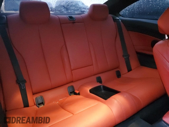 2016 BMW 4 Series 435i xDrive z VIN WBA3R5C59GK374383, wystawiony jako Copart lot #87587245 z przebiegiem 140 897 mil mil oraz Czysty tytuł • Clean title. Historia ofert i sprzedaży dostępna na DreamBid. Obrazek 10.