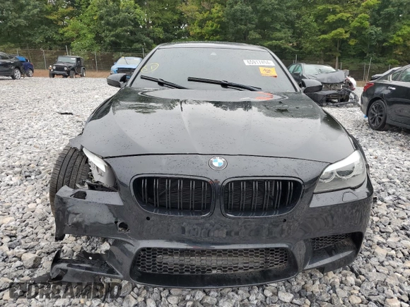 2013 BMW M5 with VIN WBSFV9C53DD096852, listed as a Copart auction lot 65917404 with 0 mi miles and Salvage Title. Bid and sale history available at carsss.com. Image 5.