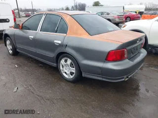 2003 Mitsubishi Galant ES with VIN 4A3AA46G83E136877, listed as a IAAI auction lot 41469411 with 307,492 mi miles. Bid and sale history available at carsss.com. Image 3.