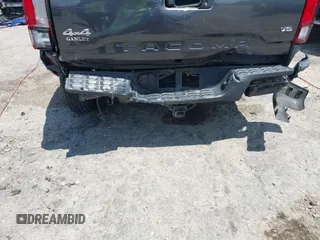 2021 Toyota Tacoma SR z VIN 3TMCZ5AN2MM392590, wystawiony jako IAAI lot #42178072 z przebiegiem 42 542 mil mil oraz . Historia ofert i sprzedaży dostępna na DreamBid. Obrazek 6.