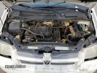 2009 Dodge Grand Caravan SE z VIN 2D8HN44E29R631418, wystawiony jako Copart lot #54954675 z przebiegiem 271 986 mil mil oraz Szkoda całkowita • Salvage title. Historia ofert i sprzedaży dostępna na DreamBid. Obrazek 12.