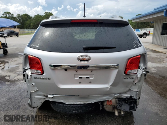 2012 Kia Sorento EX z VIN 5XYKU4A27CG229651, wystawiony jako Copart lot #60314715 z przebiegiem 117 876 mil mil oraz Szkoda całkowita • Salvage title. Historia ofert i sprzedaży dostępna na DreamBid. Obrazek 6.