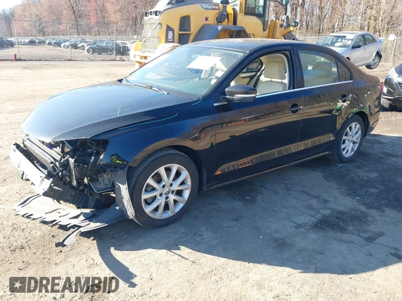 2013 Volkswagen Jetta Sedan SE w/Convenience/Sunroof with VIN 3VWDX7AJ9DM424595, listed as a IAAI auction lot 41807615 with 102,971 mi miles. Bid and sale history available at carsss.com. Image 2.