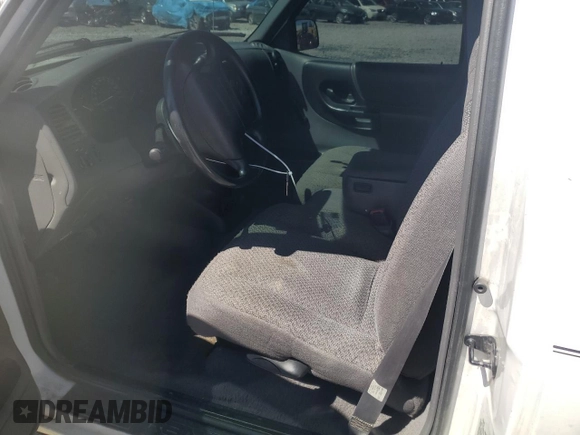 1999 Ford Ranger XL with VIN 1FTYR10C2XUB79251, listed as a Copart auction lot 49292095 with 73,127 mi miles and Salvage Title. Bid and sale history available at DreamBid. Image 7.