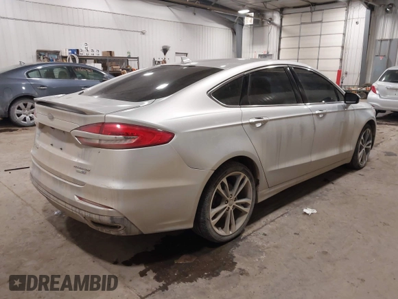2019 Ford Fusion Titanium with VIN 3FA6P0D9XKR152553, listed as a IAAI auction lot 41603426 with 129,993 mi miles. Bid and sale history available at carsss.com. Image 4.