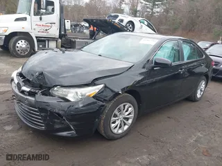 2015 Toyota Camry XLE with VIN 4T4BF1FK1FR515288, listed as a IAAI auction lot 41951737 with 74,471 mi miles. Bid and sale history available at carsss.com. Image 17.