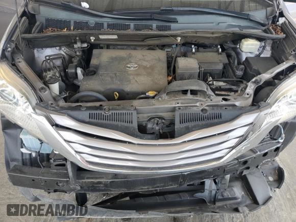 2015 Toyota Sienna XLE с VIN 5TDYK3DC0FS630013, выставлен на аукционе Copart как лот 60044955 с пробегом 124 063 миль миль и Списание • Salvage title. История ставок и продаж доступна на DreamBid. Изображение 12.