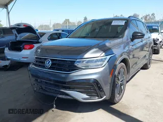 2022 Volkswagen Tiguan SE R-Line Black with VIN 3VVCB7AX8NM039730, listed as a IAAI auction lot 42313651 with 71,759 mi miles and . Bid and sale history available at DreamBid. Image 18.