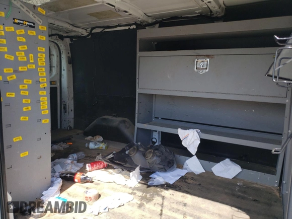 2016 Ford Transit Cargo z VIN 1FTYE1YM6GKB48783, wystawiony jako Copart lot #50741825 z przebiegiem 151 331 mil mil oraz Szkoda całkowita • Salvage title. Historia ofert i sprzedaży dostępna na DreamBid. Obrazek 11.