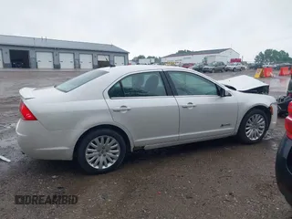 2010 Mercury Milan Hybrid with VIN 3MEDM0L35AR612321, listed as a IAAI auction lot 42297872 with 205,182 mi miles and . Bid and sale history available at DreamBid. Image 14.