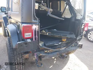 2018 Jeep Wrangler JK Unlimited Sahara with VIN 1C4HJWEG8JL921293, listed as a IAAI auction lot 41413264 with 90,566 mi miles. Bid and sale history available at carsss.com. Image 6.