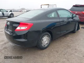 2013 Honda Civic Cpe LX with VIN 2HGFG3B54DH520527, listed as a IAAI auction lot 41419948 with 243,504 mi miles. Bid and sale history available at carsss.com. Image 4.