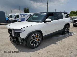 2023 Rivian R1S Adventure z VIN 7PDSGABA7PN021756, wystawiony jako Copart lot #67650414 z przebiegiem 3284 mil mil oraz Szkody całkowita. Historia ofert i sprzedaży dostępna na DreamBid. Obrazek 1.